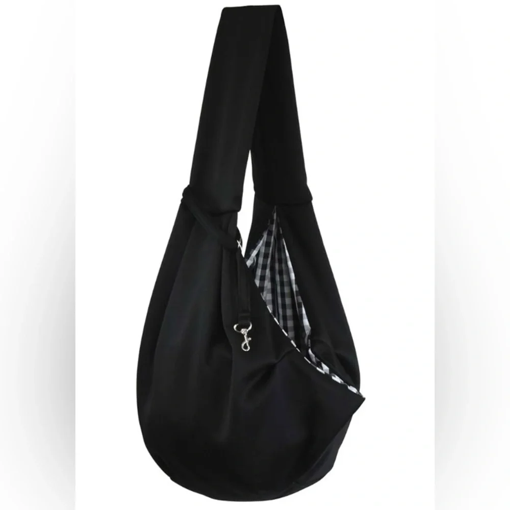 Dog and Cat Sling Carrier. Hands Free and  Reversible for medium pets.